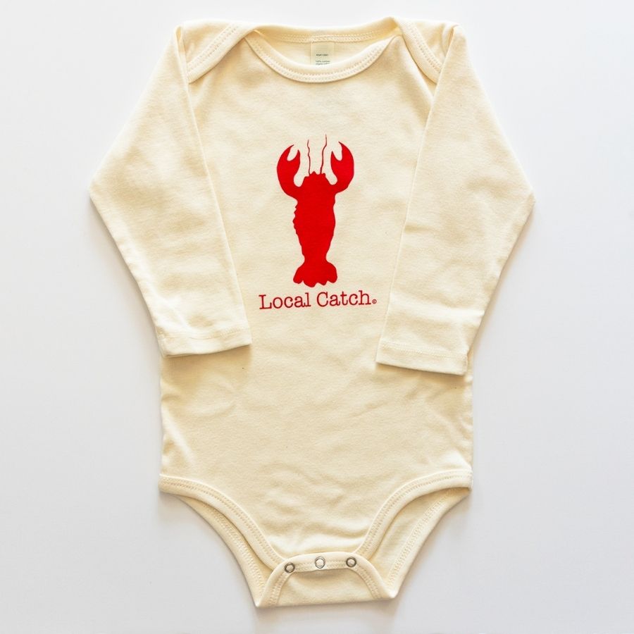Beige baby onesie with red lobster graphic and 'Local Catch' text on a white background