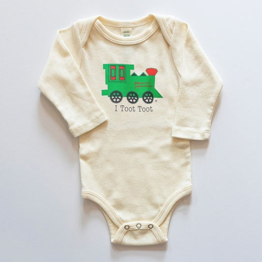 Beige baby onesie with a green train design and text on a white background