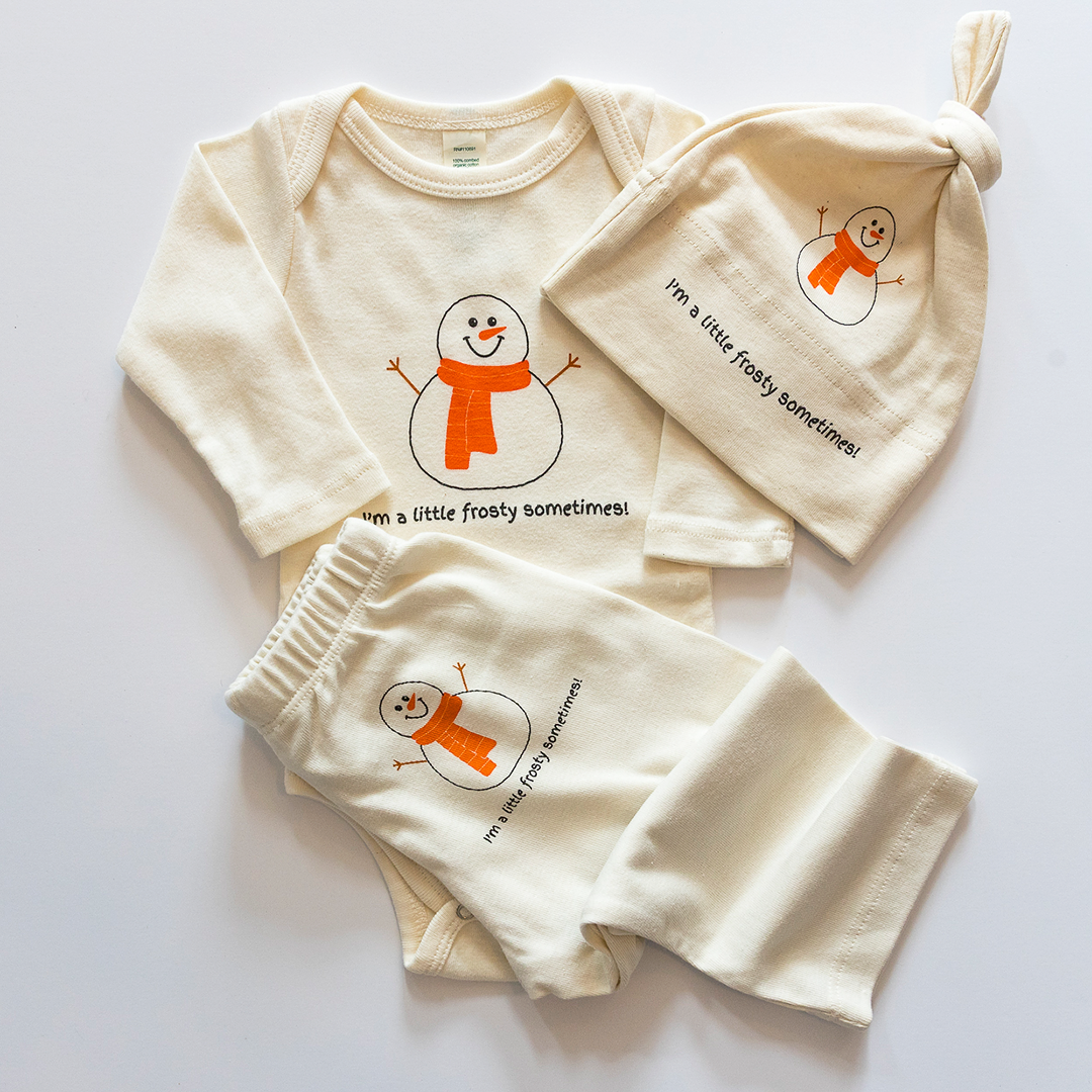 Baby outfit set with snowman design on a white background