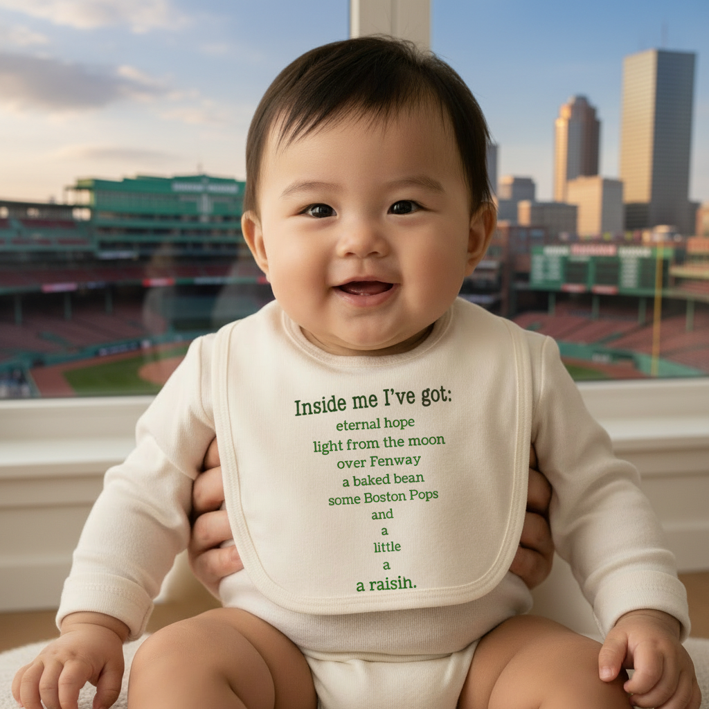 Baby wearing Boston Poem bib with Boston background