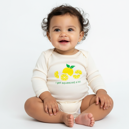 baby girl wearing lemon design romper